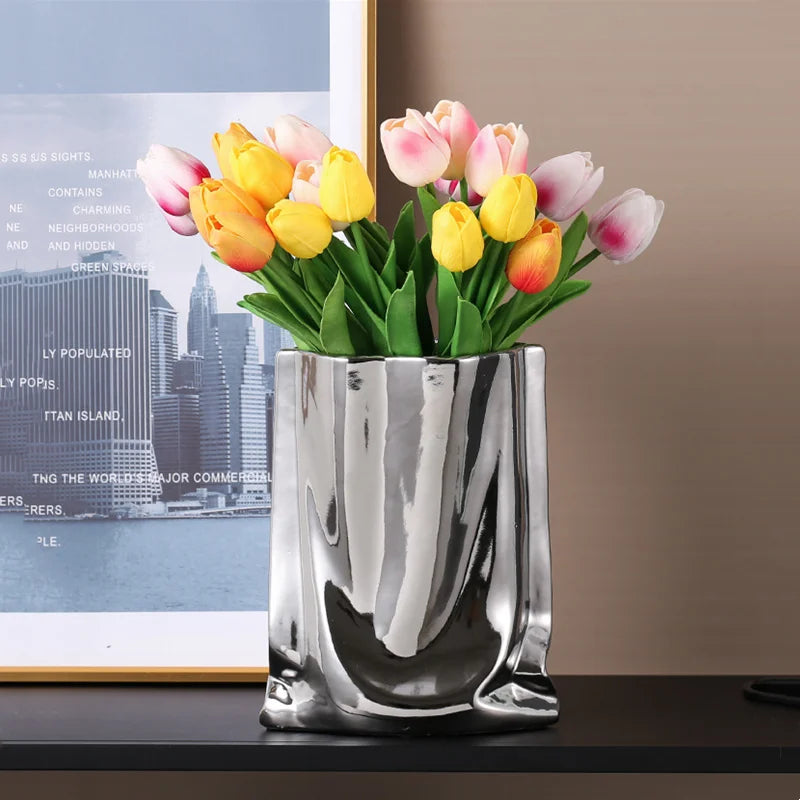 Electroplated silver vase