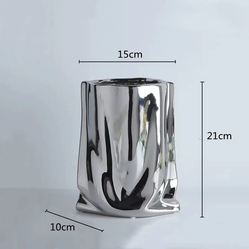 Electroplated silver vase