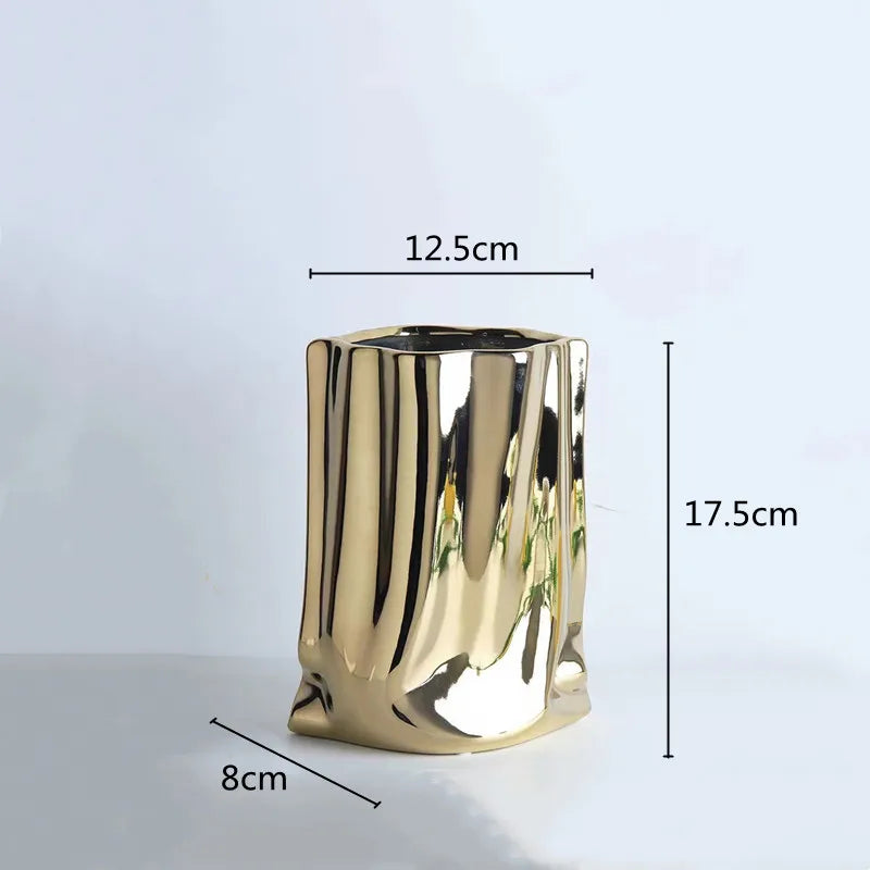 Electroplated gold vase