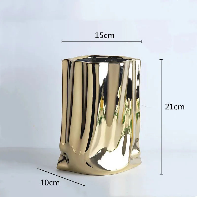 Electroplated gold vase