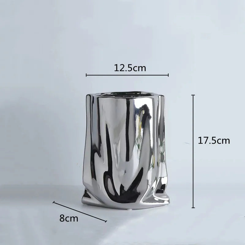 Electroplated silver vase