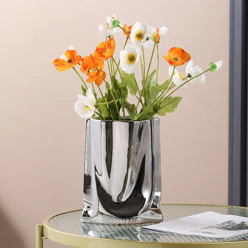 Electroplated silver vase