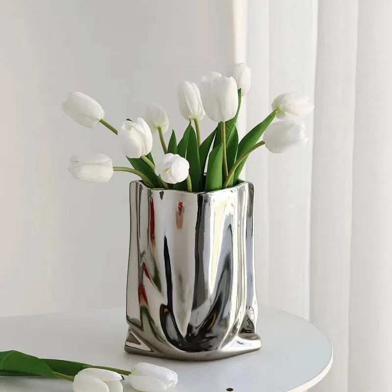 Electroplated silver vase