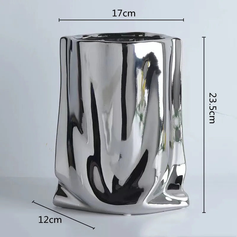 Electroplated silver vase